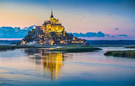 Panoramic View Of Famous Le Mont Saint Michel Tidal Island In Beautiful