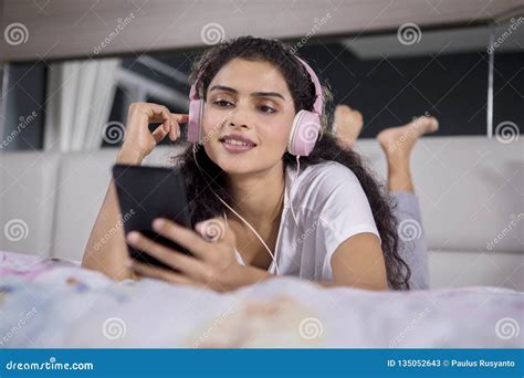 Pretty Girl Hearing Music On The Bed Stock Image Image Of Happy Cute