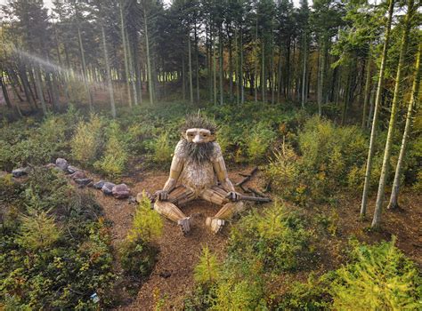Recycled Wooden Giant Troll Sculptures Visitors Should Be Greeted In