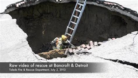 Toledo Sinkhole Watch Driver S Miracle Escape After Road Opens Up