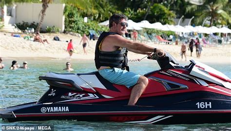 Simon Cowell Hits Barbados Beach With Swimsuit Clad Lauren Silverman