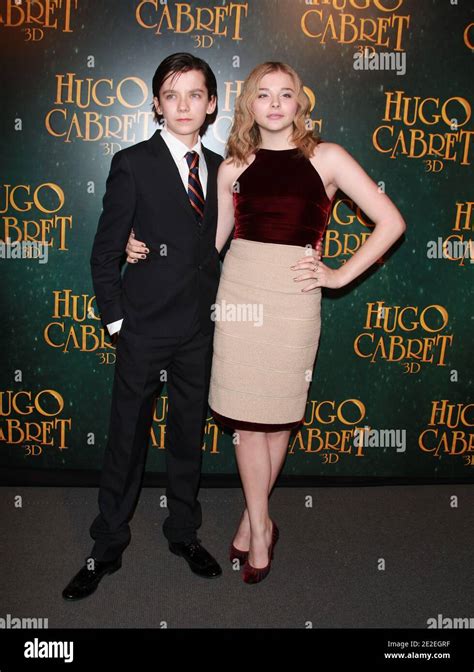Asa Butterfield And Chloe Grace Moretz Attending The French Premiere Of Hugo Cabret Held At