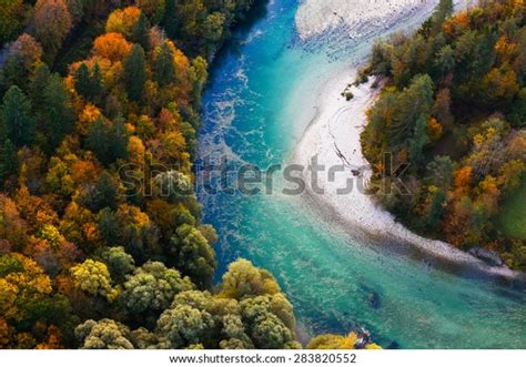Pristine Alpine Turquoise River Meandering Through Stock Photo