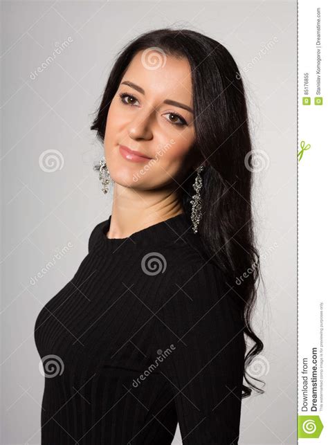 lovely girl with black hair on a gray background stock image image of fashion female 85176855