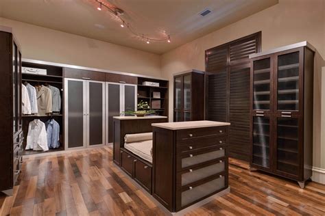 Dark Wooden Cabinetry And Glass Doors Give A Sophisticated Look To This