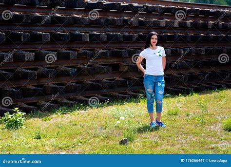 Portrait Of A Beautiful Brunette That Stands Near The Railway Tracks Stock Image Image Of