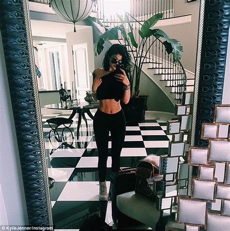 Kylie Jenner Copies Older Sister Kim Kardashians Mirror Selfie Daily Mail Online