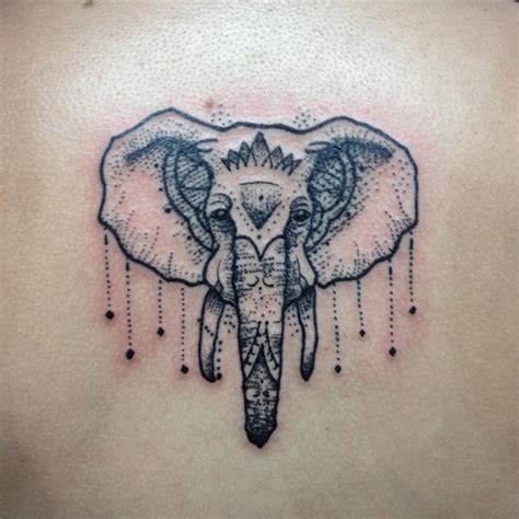 geometric elephant head tattoo by daniel rozo