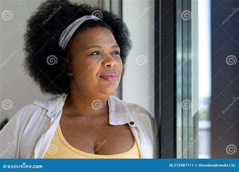 Thoughtful Plus Size African American Woman Looking Out Of Window Stock Image Image Of Adult