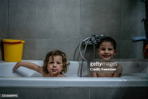 Two Girls Taking Shower Together Photos And Premium High Res Pictures