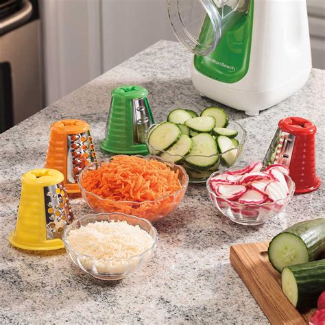 Using the largest holes on the box grater is good for when you want shreds of zucchini that don't totally disappear in a recipe. SaladXpress™ Food Processor with 4 Cones - 70950 ...