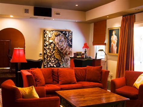 The smith's family's screening room includes luxurious upholstered club chairs. Media-Room Makeovers for Four Hollywood Celebs | DIY