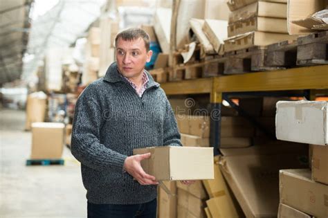 Man Warehouse Worker Carrying Boxes Stock Image Image Of Store