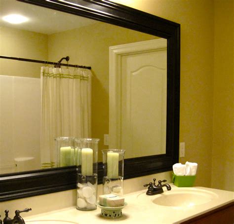 Diy a mirror frame to turn that ugly builder grade mirror with clips into a more modern design in under 2 hours and less than $20! corecoloro and the imaginings: Bathroom Mirror Frame ...