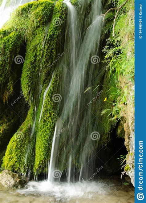 Waterfall In The Middle Moss In The Forest Long Exposure Stock Image