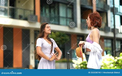 Two Beautiful Women Talking And Standing Outdoors Stock Video Video