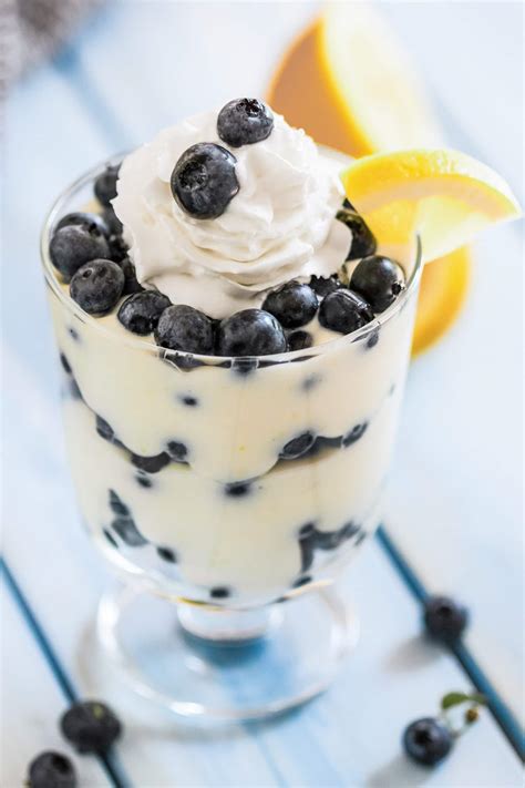 A healthy dessert idea with fresh blueberries & topped with an oatmeal cinnamon pecan topping! Healthy Blueberry Lemon Ricotta Parfaits Recipe | Sugar Free, Low Carb