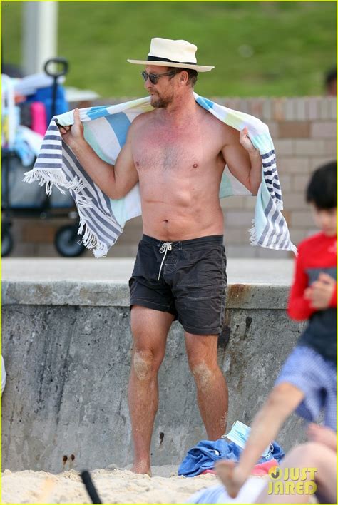 Photo Simon Baker At The Beach With Son Claude Baker 01 Photo 4634036 Just Jared