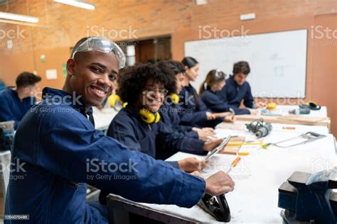 Happy Group Of African American Students In A Carpentry Class Stock