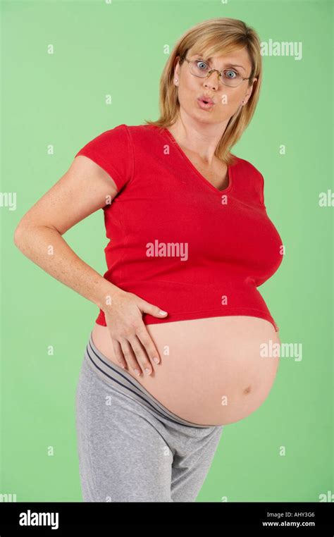 Attractive Healthy Young Pregnant Woman Wearing Glasses With Expression
