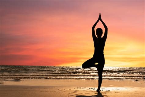 Premium Photo Silhouette Young Woman Practicing Yoga On The Beach At