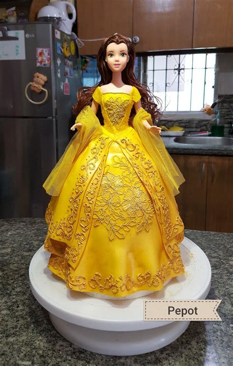 Following the directions in the recipe card below, bake cake according to package instructions. Disney's belle doll cake | Disney doll cake, Princess ...