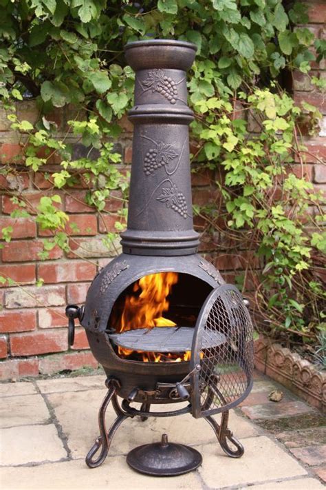 A fireplace makes a home. Patio Time! | Fire pit chimney, Portable fire pits, Fire pit backyard