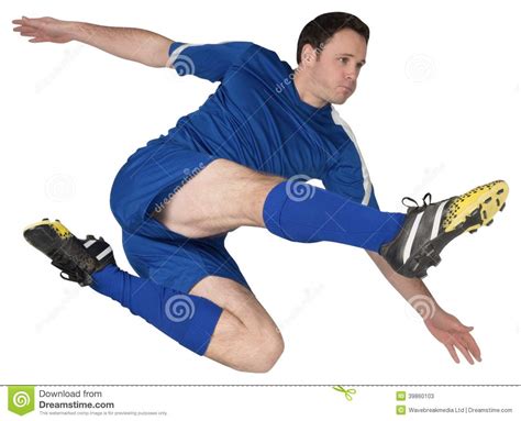 Football Player In Blue Kicking Stock Image - Image of handsome ...