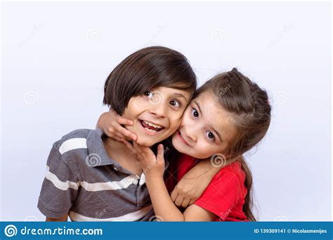 Two Kids Hugging Each Other Stock Image Image Of