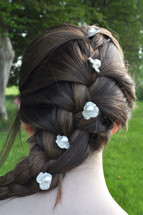 beautiful pearl and diamante flower pins work really well with this classic french plait simple