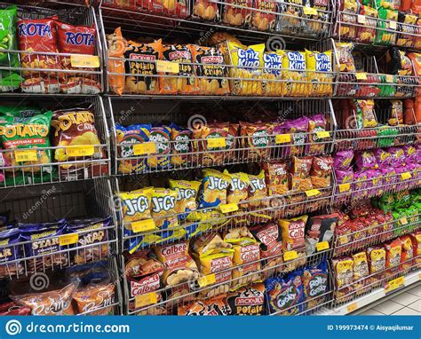 Packed Miscellaneous Junk Foods & Snacks On Rack And Display On The ...