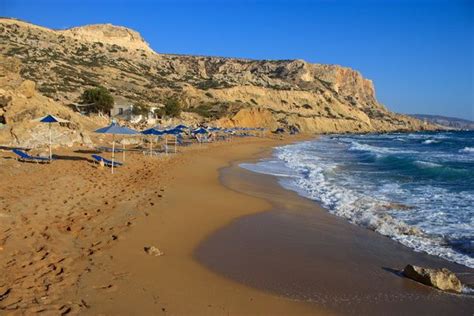 The settlers back then carved a set of caves in the soft rock of the mountain. Red Beach, Matala