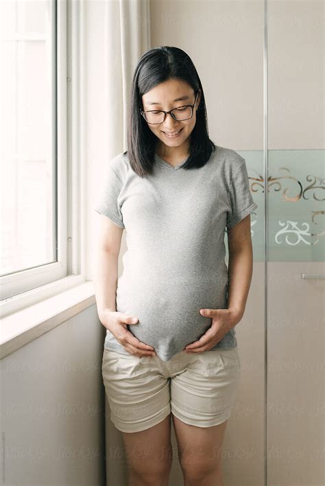 Portrait Of Chinese Pregnant Woman By Stocksy Contributor Maahoo Stocksy