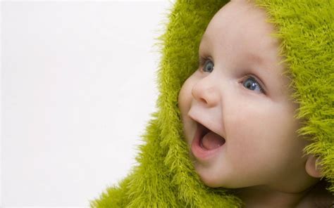 Download Newborn Baby Green Outfit Wallpaper