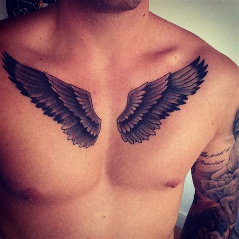 chest piece wings tattoo wings tattoo wing tattoo tattoos