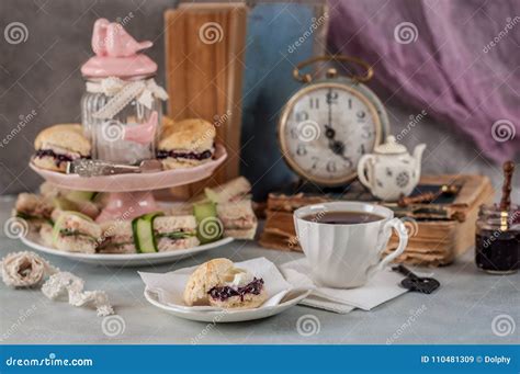 English Afternoon Tea Set Including Hot Tea Pastry Scones Sandwiches