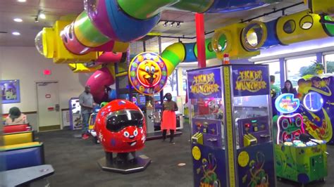 The restaurants serve pizza and other menu items, and feature arcade games. Chuck E. Cheese's Lewisville Store Tour - YouTube