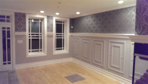 Half Wall Paneling With Custom Wall Paper And Recessed Led Lights