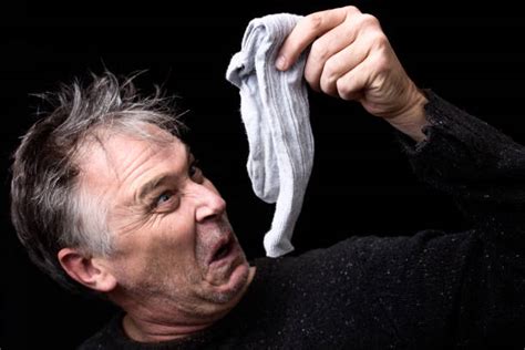 Holding Smelly Socks Stock Photos Pictures And Royalty Free Images Istock