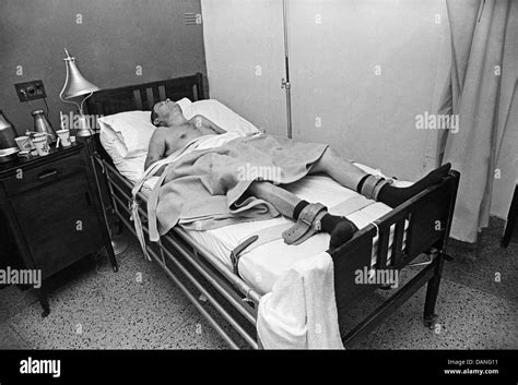 An Alcoholic Man Strapped Into His Bed In The Delirium Tremen Ward At A New Mexico Hospital