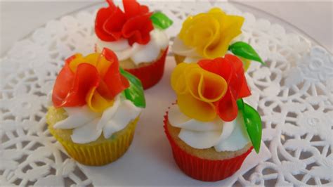 They look great on top of frosting on cupcakes. Decorating Cupcakes #125: Fruit Roll Up Flowers - YouTube