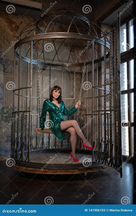 Beautiful Woman Sitting In A Cage Alone Because Of Her Limitations And Complexes Adult Female