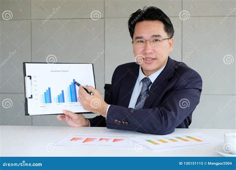 Businessman Presenting Business Information At Office Meeting Business