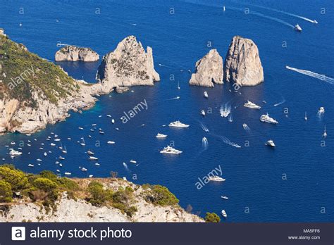Campania, regione, southern italy, on the tyrrhenian sea between the garigliano (lower liri) river (north) the region comprises the provinces of avellino, benevento, caserta, napoli, and salerno. Capri Faraglioni from Solaro Mount, Anacapri, Capri Island ...