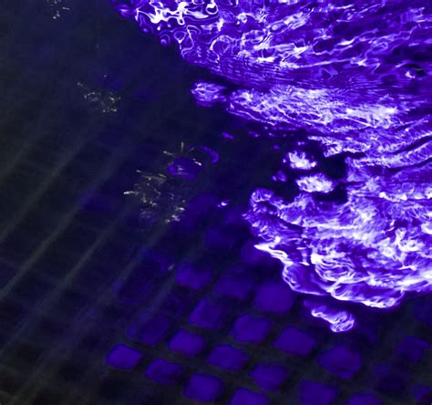 Purple Splash Purple Lit Water Splash In A Pool Reflection Raedn