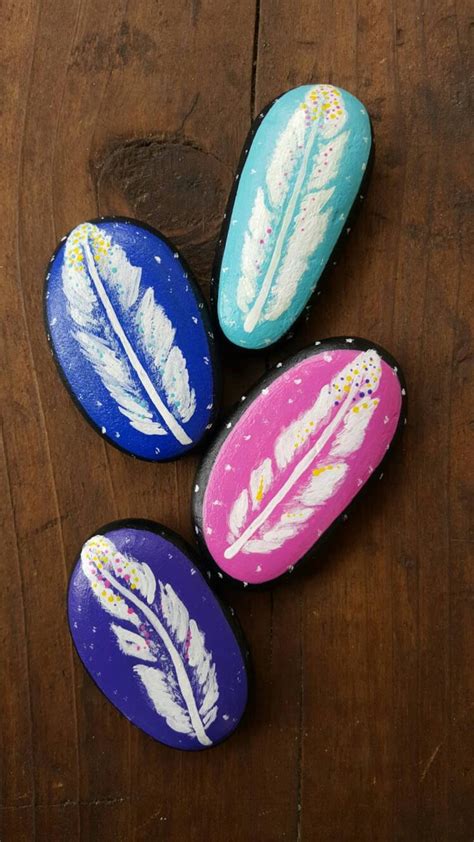 Hand painted rocks painted stone rock art feathers rocks. | Etsy