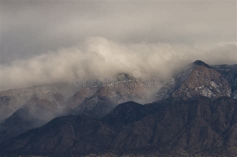 Storm Clouds Rolling In Over The Sandia Mountains In Albuquerque New