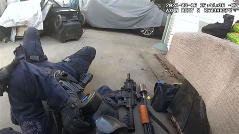lapd swat officer shot in the face before gunman is killed in standoff intense video shows