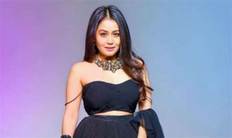 Neha Kakkar Looks Smoking Hot In Gorgeous Black Crop Top And Fluffy Long Skirt In Her Latest