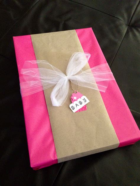 What do the parents really need? DIY baby shower gift wrap idea. Solid pink wrapping paper ...